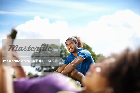 Young couple taking a break in park