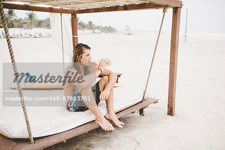 Australian surfer on makeshift bed, Bacocho, Puerto Escondido, Mexico