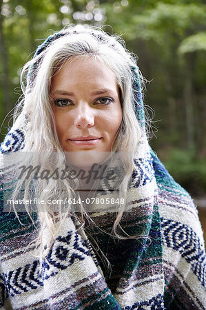 Woman with blanket around her