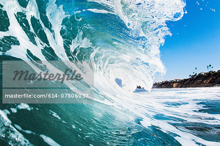 Close up of rolling wave and foamy sea Close up of rolling wave and foamy sea