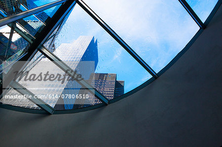 Skyscrapers  from curved window in financial district, Manhattan, New York, USA