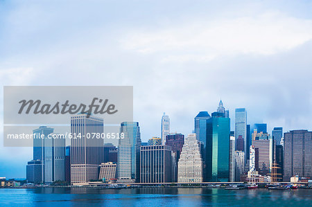 View of East river and Lower Manhattan skyline, New York, USA