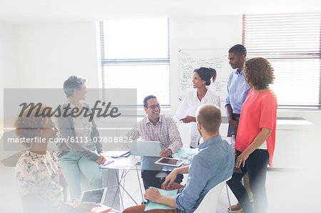 Group of business people having meeting in modern office