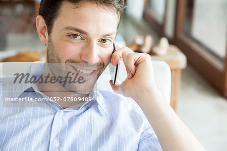 Man talking on cell phone, portrait