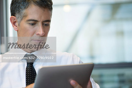 Businessman using digital tablet