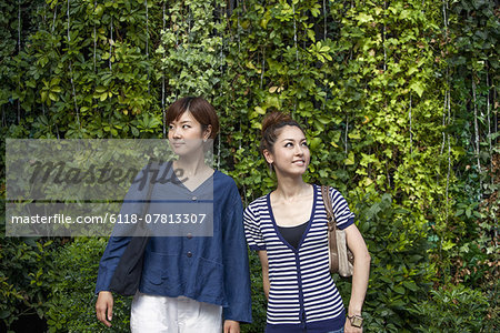 Two women standing side by side.