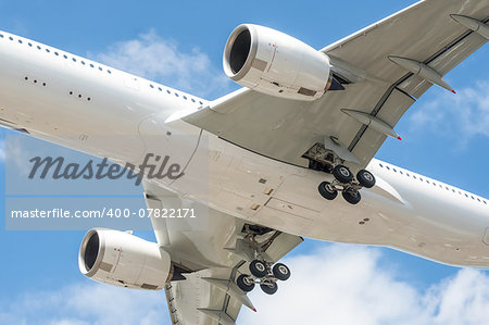 closeup of a large passenger aircraft undercarriage -
