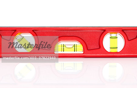 Red spirit level with shadow on white background