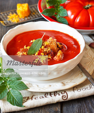 Delicious roasted tomato soup with cheese and garlic croutons.