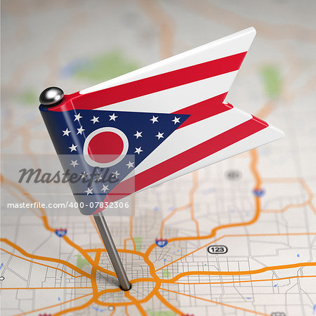 Small Flag of Ohio on a Map Background with Selective Focus.