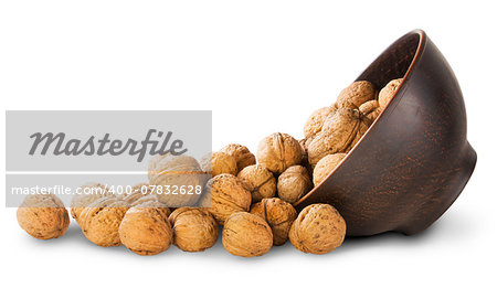 Walnuts Spill Out Of A Clay Bowl Isolated On White Background