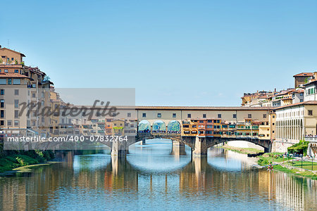 Image of Ponte Vecchio and river Arno in Florence, Italy in autumn on a sunny day