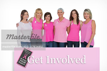 Smiling women posing with pink tops for breast cancer awareness against pink card