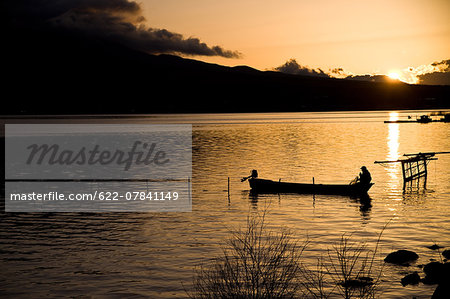 Boat at the lake at sunset