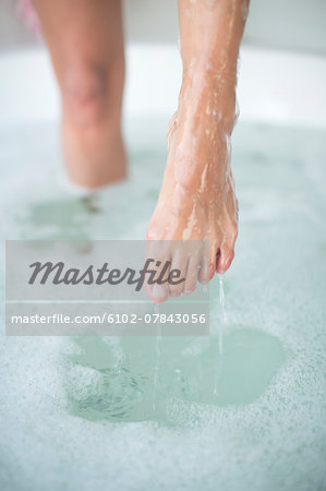 Womans feet in bath
