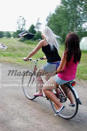 Young women cycling