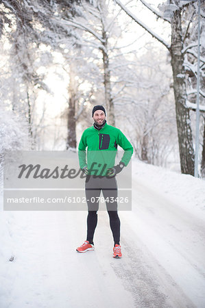 Mid adult man in sports clothes at winter