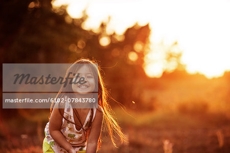 Laughing girl looking at camera