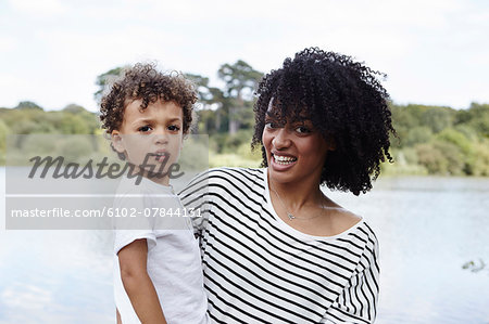 Mother with son at water