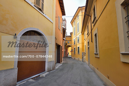 Old buildings and street in autumn, Cremona, Lombardy, Italy