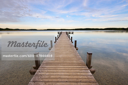 Wooden Jetty at Sunset, Lake Woerthsee, Fuenfseenland, Upper Bavaria, Bavaria, Germany Wooden Jetty at Sunset, Lake Woerthsee, Fuenfseenland, Upper Bavaria, Bavaria, Germany