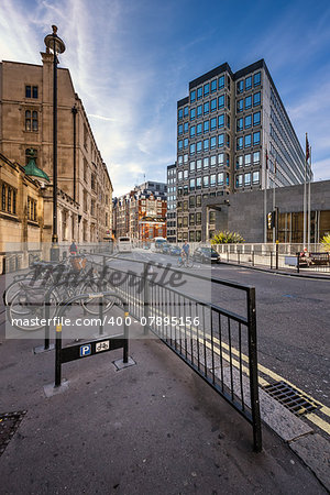 LONDON - OCTOBER 5, 2014: Typical sidewalk with Rental Bicycles Parking in London. Cycle hire scheme founded by Boris Johnson mayor of London and Barclays in London, United Kingdom - January 20, 2013.