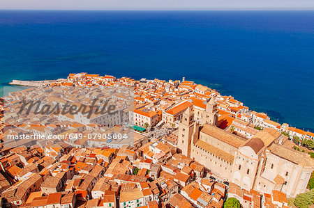 View of coast and town of Cefalu, Sicily, Italy