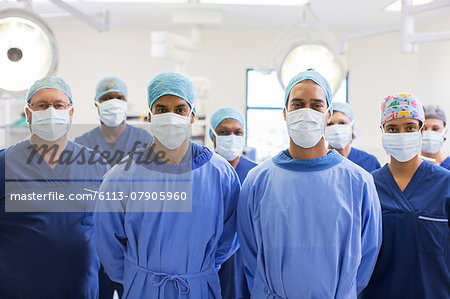 Team of surgeons in operating theater