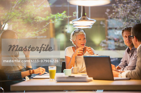 Business people talking in office meeting Business people talking in office meeting