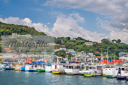 Indonesia, Flores Island, Labuhan Bajo. The busy harbour on Flores Island which has become the departure point for tourists visiting the famous Komodo Dragons on Rinca and Komodo Islands.