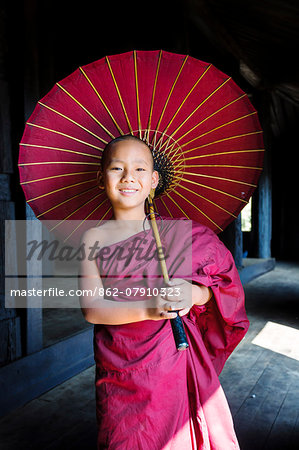 Myanmar, Mandalay division, Bagan. Young novice monk inside a monastery (MR) Myanmar, Mandalay division, Bagan. Young novice monk inside a monastery (MR)