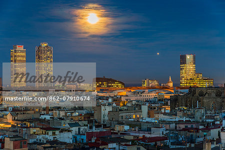 Night panoramic view over Born neighborhood with Hotel Arts and Mapfre skyscrapers behind, Barcelona, Catalonia, Spain