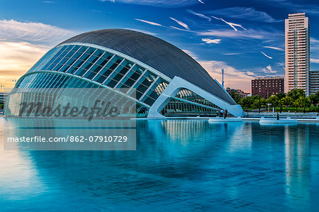 Sunset view of the l'Hemisferic Planetarium and Imax Cinema, located in the City of Arts and Sciences, Ciutata de les Arts i les Ciencies, Valencia, Spain.
