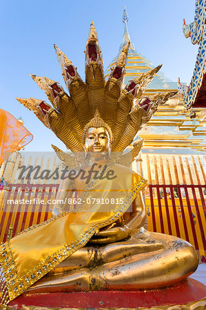 Thailand, Chiang Mai. Buddha statue inside Wat Phra Doi Suthep temple