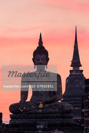 Thailand, Sukhothai Historical Park. Wat Mahathat temple at sunset