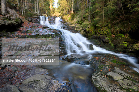 Scenic view of waterfall and stream in autumn, Bavarian Forest Natonal Park, Bodenmais, Regen District, Bavaria, Germany Scenic view of waterfall and stream in autumn, Bavarian Forest Natonal Park, Bodenmais, Regen District, Bavaria, Germany