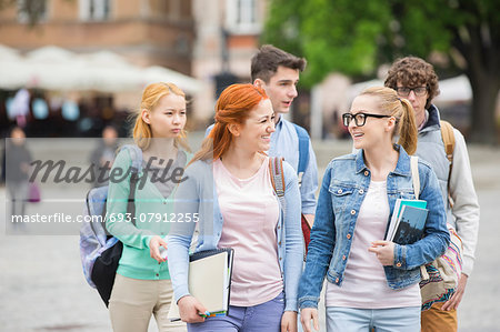 Group of college friends walking outdoors