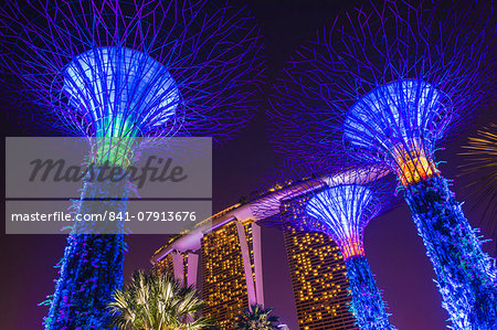 Gardens by the Bay and Marina Bay Sands Hotel at night, Singapore, Southeast Asia, Asia