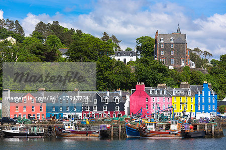 Multi-coloured buildings on the waterfront at Tobermory, Isle of Mull, Inner Hebrides, Scotland, United Kingdom, Europe