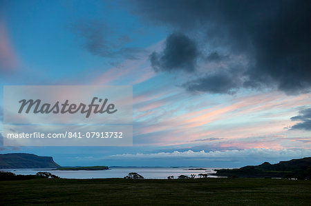 Panoramic sky of pink and blue pastel colours over Loch Na Keal at sunset on the Isle of Mull, Inner Hebrides, Western Isles, Scotland, United Kingdom, Europe