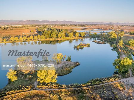 aerial view of Arapaho Bend, one of natural areas in Fort Collins, Colorado along the Poudre River converted from a gravel mining quarry