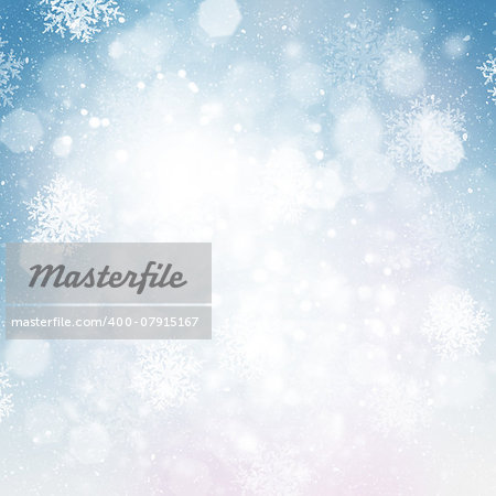 Blurred bokeh christmas background with snowflakes