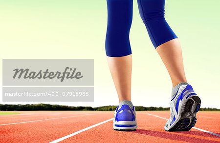 Women Feet on Running Tracks