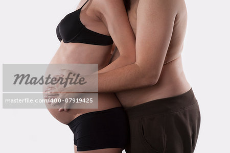 pregnant woman and fat man in love on white background