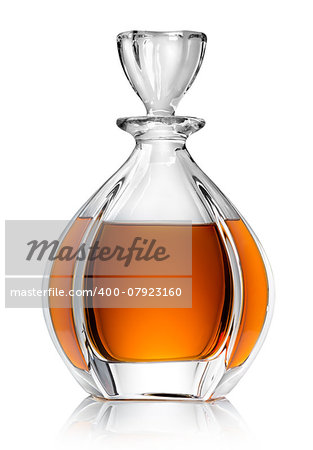 Carafe with whiskey isolated on a white background