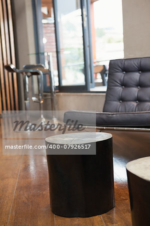 Close up of tables and sofa in a bar