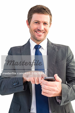 Businessman sending a text message on white background