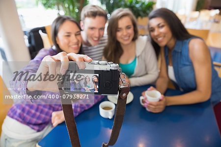 Young students taking a selfie at the university
