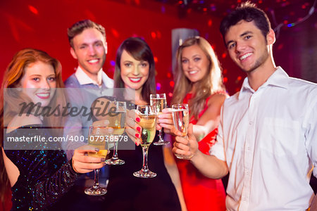 Happy friends on a night out together at the nightclub