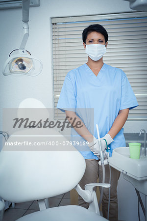 Portrait of female dentist wearing surgical mask